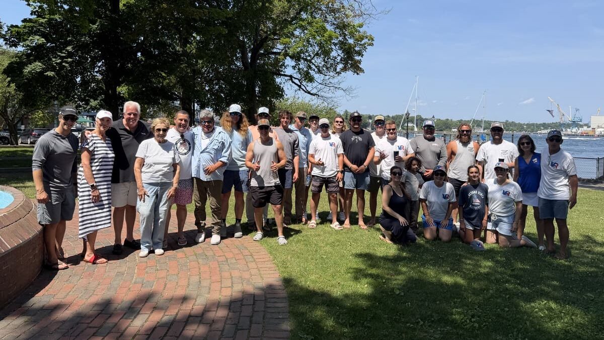 Group photo featuring anglers, volunteers, and event organizers of the Striped Bass Tournament